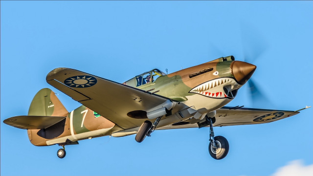 Small plane shark wing flying free wallpaper for desktop - medium preview image