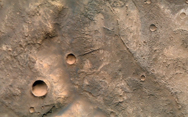 Rock wall holes dirt closeup free wallpaper for desktop - medium preview image