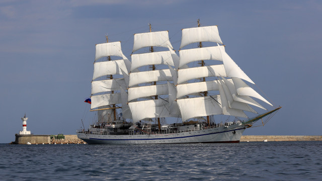 Sailboat lighthouse ocean digital rendering free wallpaper for desktop - medium preview image