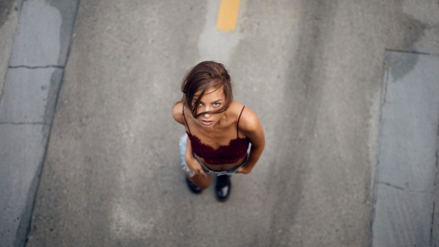 Woman surprised street blackshoes tiltshift free wallpaper for desktop - medium preview image