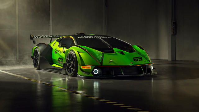 Green sports car foggy garage free wallpaper for desktop - medium preview image