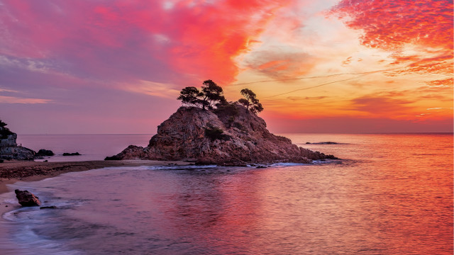 Sunset beach rock formation mystical free wallpaper for desktop - medium preview image