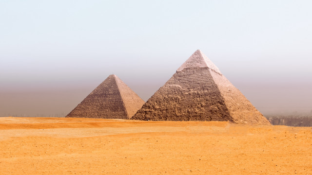 Three pyramids desert hazy sky free wallpaper for desktop - medium preview image