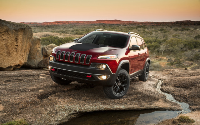Red jeep rocky cliff water free wallpaper for desktop - medium preview image