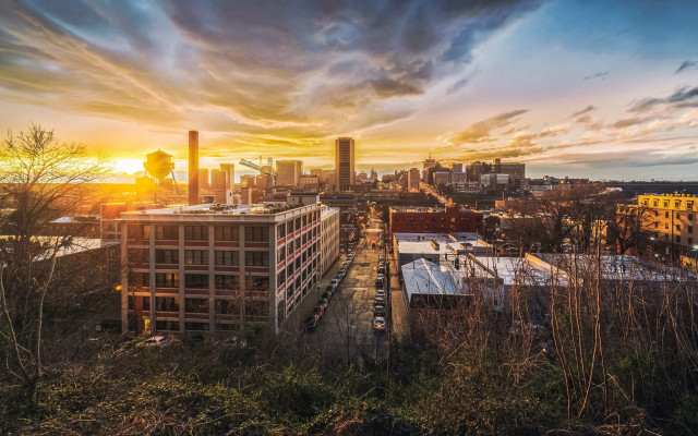 City skyline sunset cloudy horizon free wallpaper for desktop - medium preview image