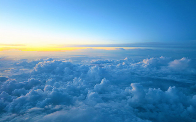 Sky clouds sun mountains ocean free wallpaper for desktop - medium preview image