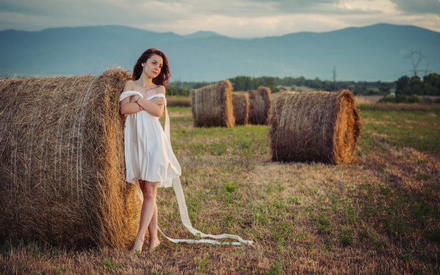 Woman white dress hay bale #2 free wallpaper for desktop - medium preview image