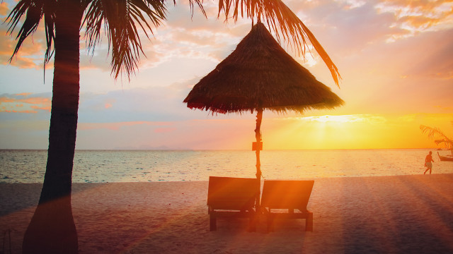 Beach chair umbrella sunset person free wallpaper for desktop - medium preview image