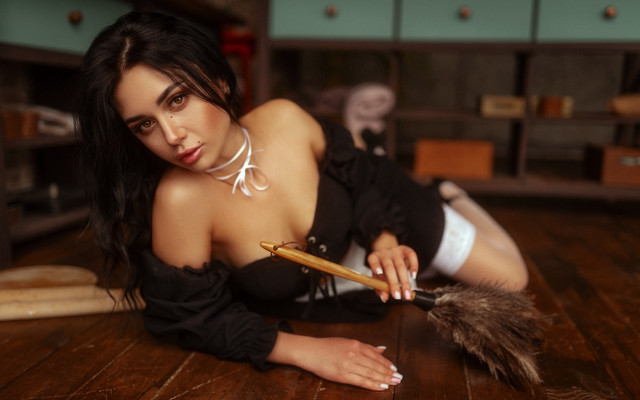 Black dress laying feather puzzle free wallpaper for desktop - medium preview image