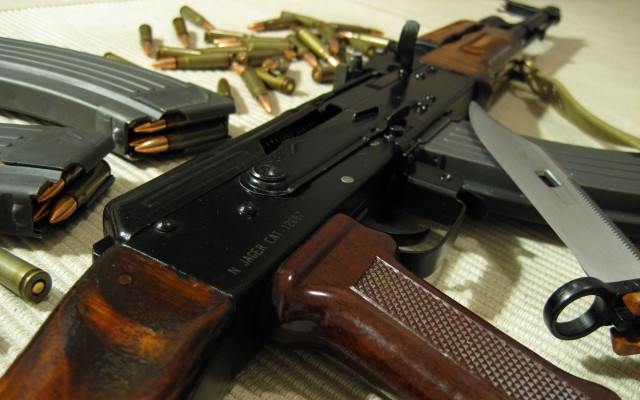 Gun table items surrounding laying free wallpaper for desktop - medium preview image