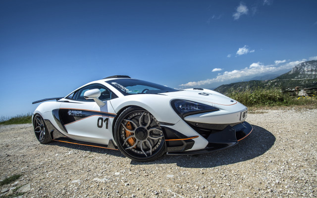 White sports car mountain road #5 free wallpaper for desktop - medium preview image