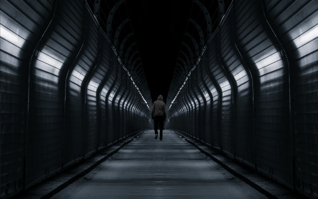 Dark hallway lit figure liminal free wallpaper for desktop - medium preview image