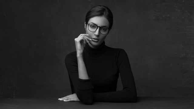 Woman glasses sitting serious blackwhite free wallpaper for desktop - medium preview image