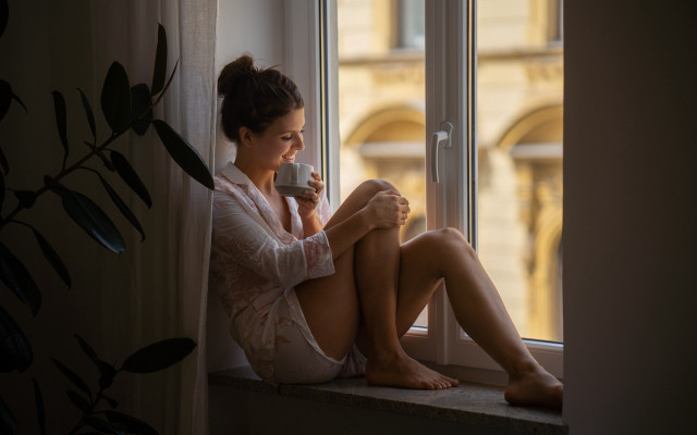 Woman sitting coffee city window free wallpaper for desktop - medium preview image