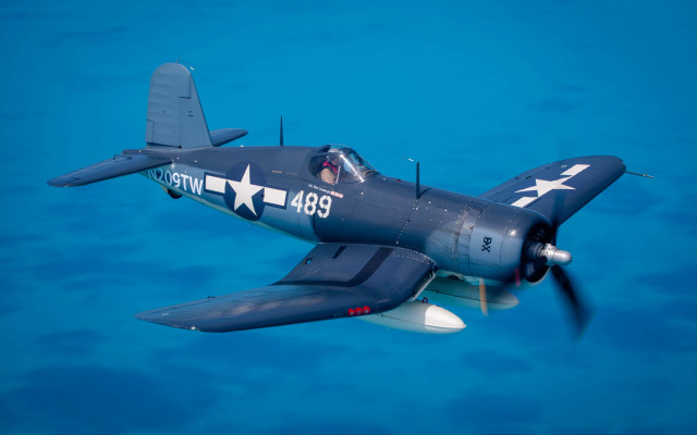 Blue white airplane over ocean free wallpaper for desktop - medium preview image