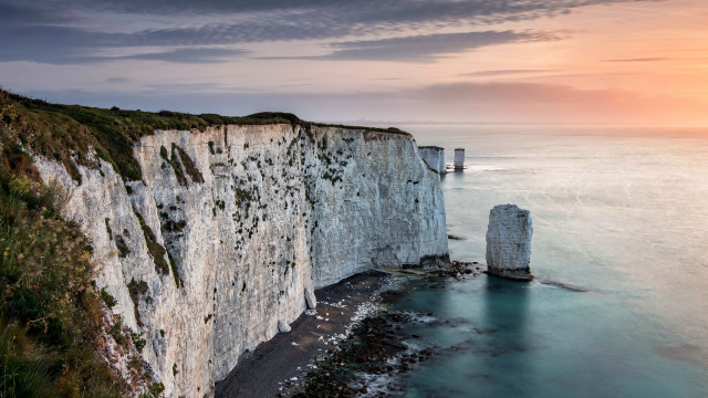 Cliff lighthouse sunset ocean mountains free wallpaper for desktop - medium preview image