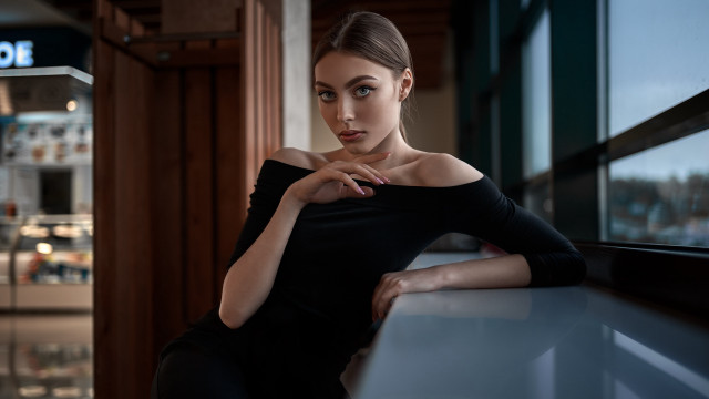 Woman sitting counter window sign free wallpaper for desktop - medium preview image