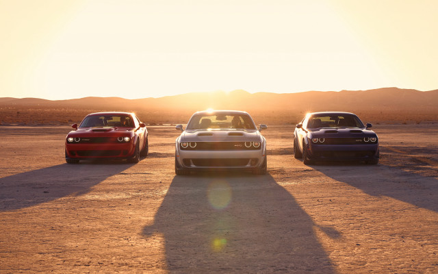 Three cars sunset parking lot free wallpaper for desktop - medium preview image
