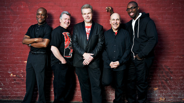 Men brick wall posing arms free wallpaper for desktop - medium preview image