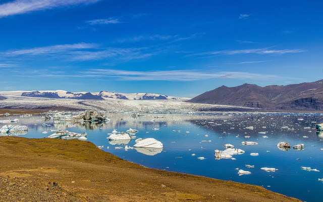 Iceberg mountains water bird sunset free wallpaper for desktop - medium preview image