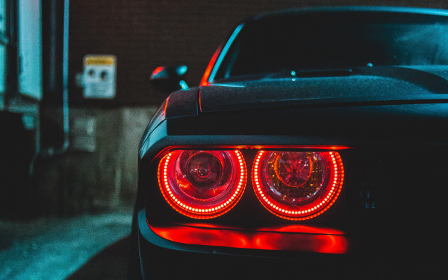 Car red taillight parked parkinglot free wallpaper for desktop - medium preview image