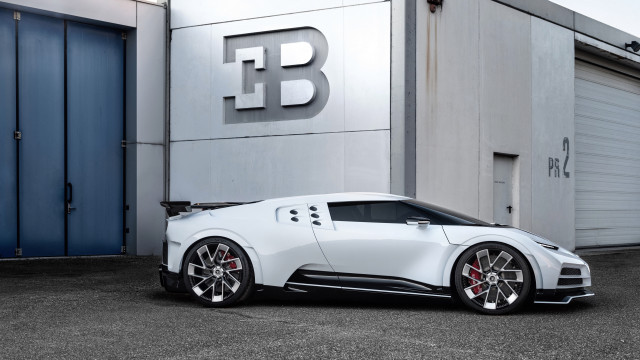 White sports car b logo free wallpaper for desktop - medium preview image