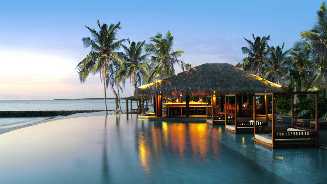 Resort pool bar thatched roof free wallpaper for desktop - medium preview image