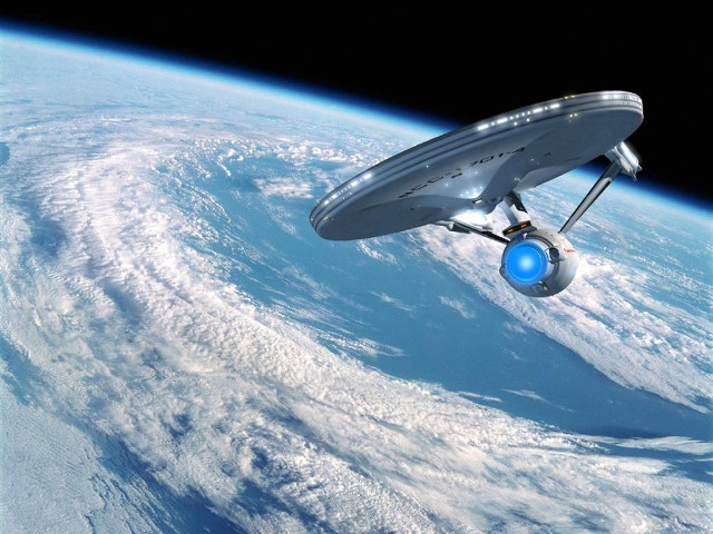 Spaceship flying over earth blue #3 free wallpaper for desktop - medium preview image