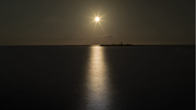 Bright sun ocean night lighthouse free wallpaper for desktop - medium preview image