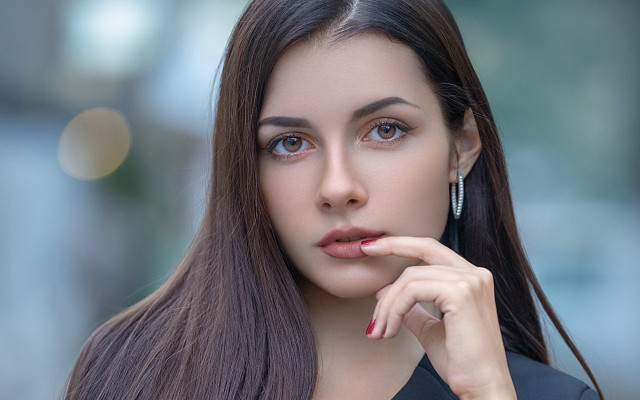 Woman longhair earrings finger chin free wallpaper for desktop - medium preview image