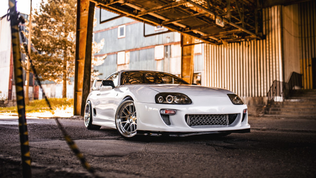 White sports car building metal free wallpaper for desktop - medium preview image