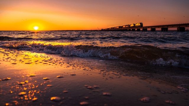 Train bridge ocean sunset waves free wallpaper for desktop - medium preview image