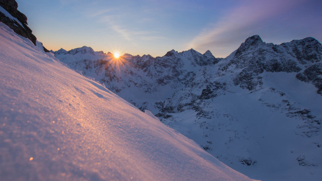 Snowboarder sunset mountains lake cityscape free wallpaper for desktop - medium preview image