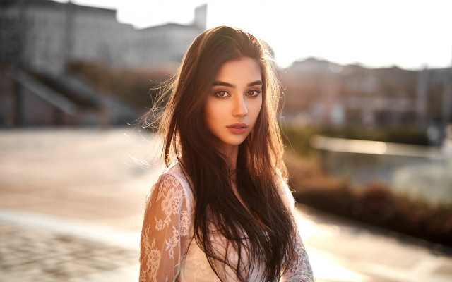 Woman long hair city sidewalk free wallpaper for desktop - medium preview image