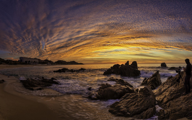 Ocean sunset rock person colorful free wallpaper for desktop - medium preview image