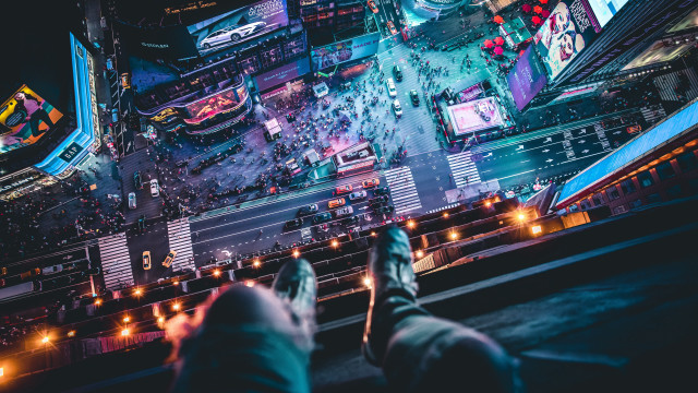 Person ledge looking city night free wallpaper for desktop - medium preview image