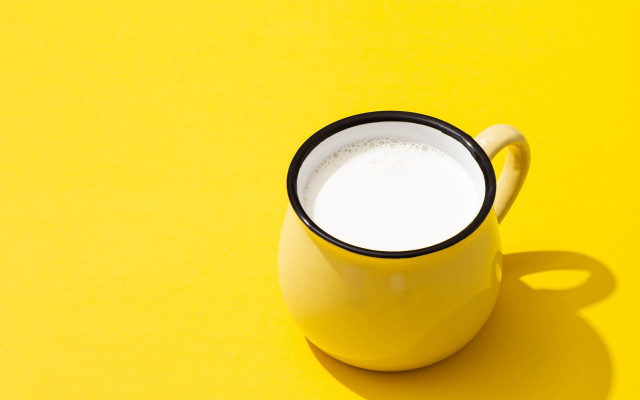 Yellow cup white substance shadow free wallpaper for desktop - medium preview image