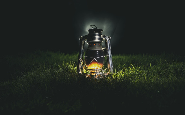 Lantern glowing flame grass forest free wallpaper for desktop - medium preview image