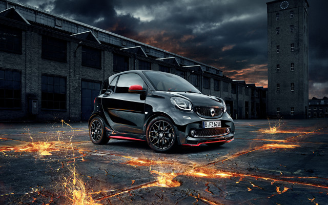 Smart car fire tires cityscape free wallpaper for desktop - medium preview image