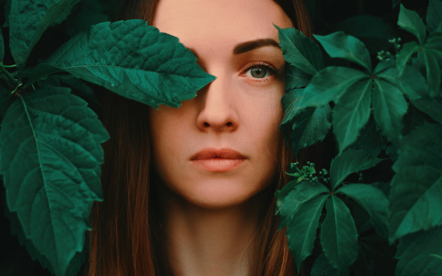 Woman hiding leaves blueeyes naturalism free wallpaper for desktop - medium preview image