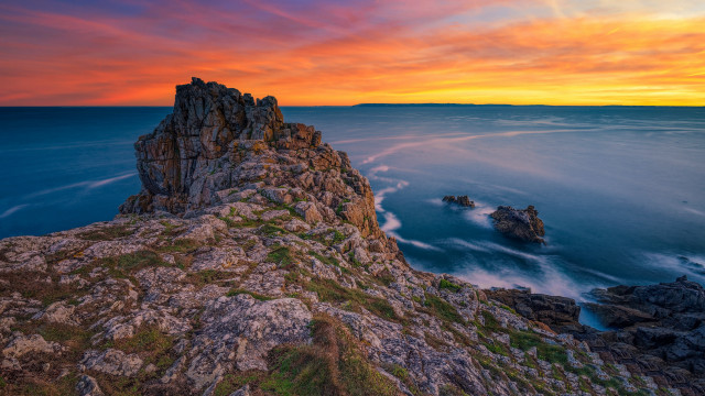 Rocky cliff water sunset bridge free wallpaper for desktop - medium preview image