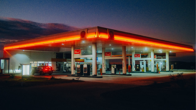Red light gasstation night car free wallpaper for desktop - medium preview image