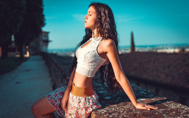 Woman leaning city outdoors beach free wallpaper for desktop - medium preview image