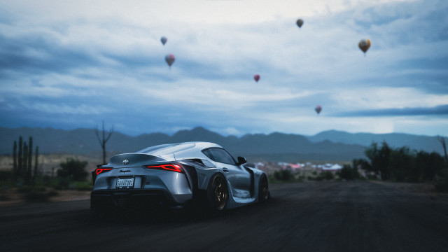 Car dirtroad hotairballoons desert panfuturism free wallpaper for desktop - medium preview image