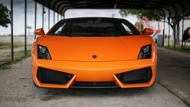 Bright orange sports car parking #4 free wallpaper for desktop - medium preview image
