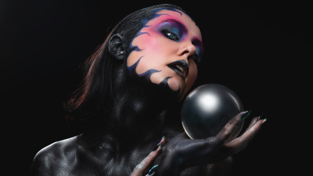 Black makeup holding ball fantasy free wallpaper for desktop - medium preview image