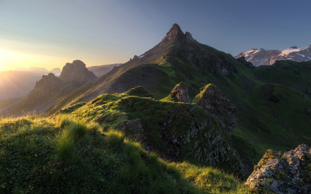 Mountain sunset grassy field lake free wallpaper for desktop - medium preview image