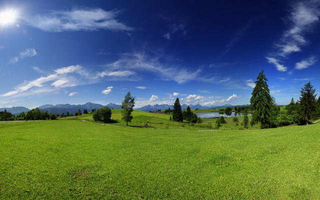 Grassy field lake blue sky free wallpaper for desktop - medium preview image