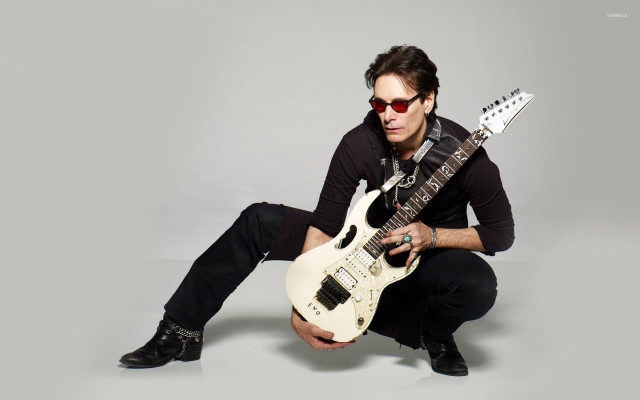Man sunglasses guitar posing picture free wallpaper for desktop - medium preview image