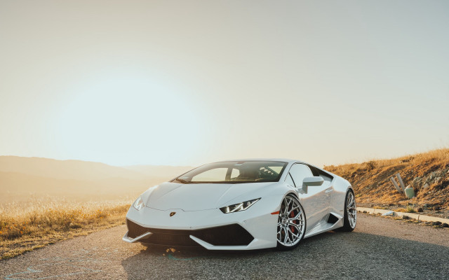 White sports car mountain road free wallpaper for desktop - medium preview image